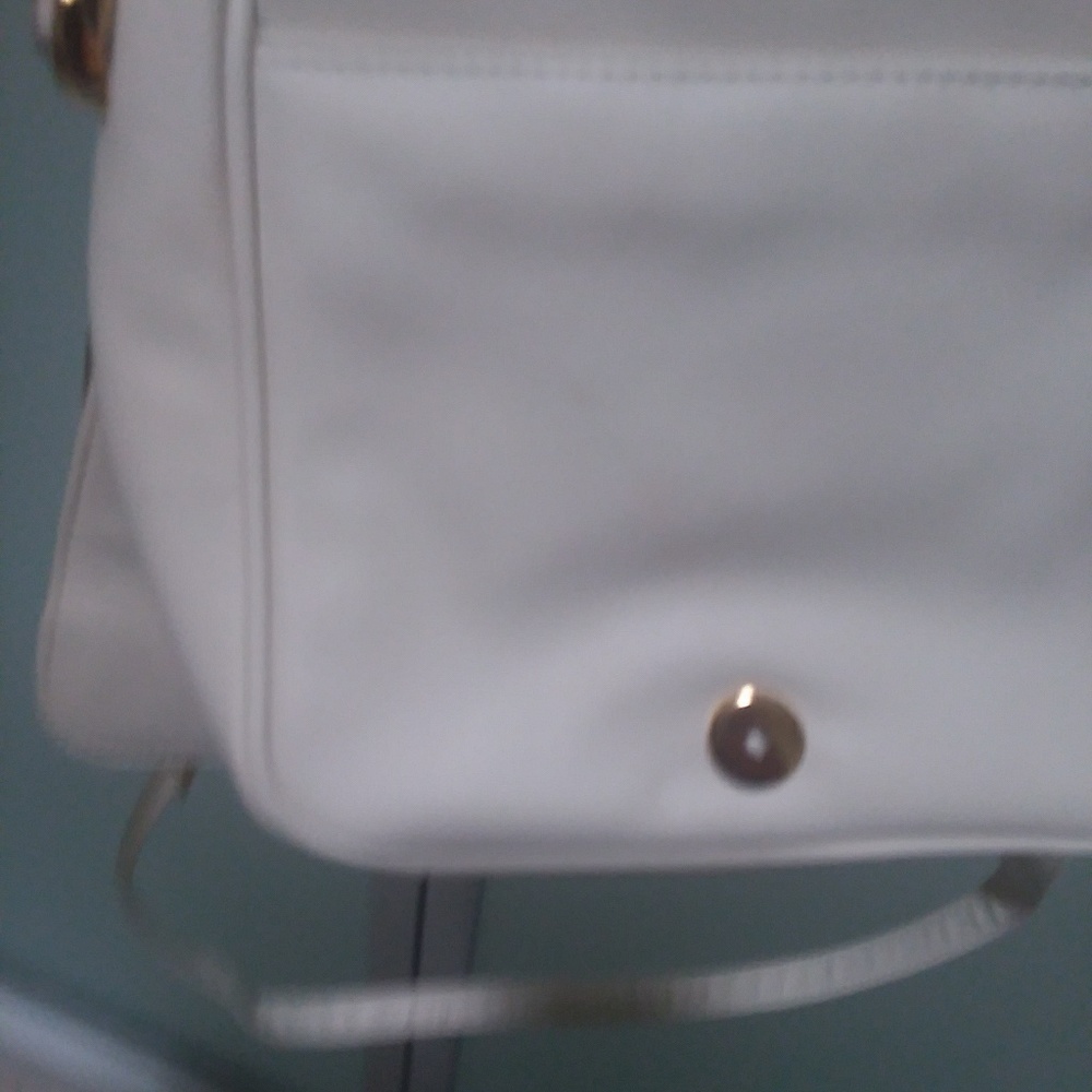 Cream-colored leather handbag
